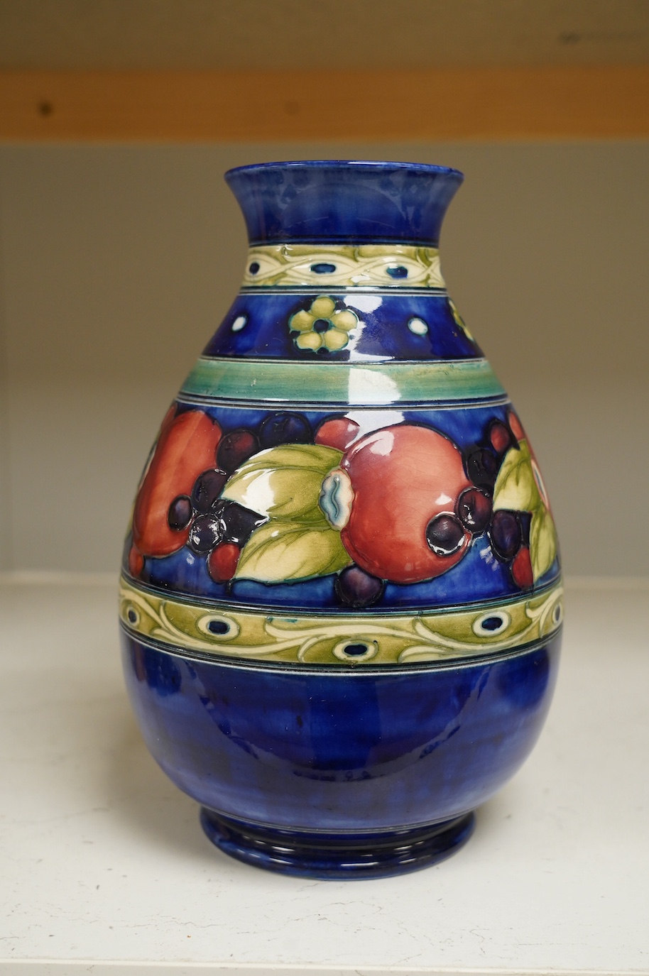 A Moorcroft banded pomegranate ovoid vase, 1930s, signed, 24cm high. Condition - good